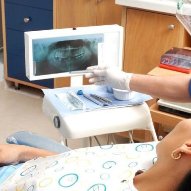 dentist speaking with patient